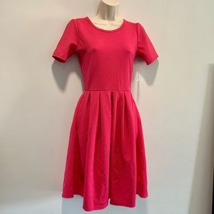 Pink Amelia dress with exposed zipper and pockets
